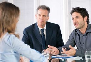 professionals in a business meeting file a divorce