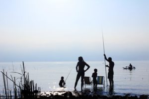 Family fishing on the beach marriage counseling