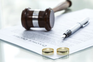 wedding rings and divorce papers mediation divorce