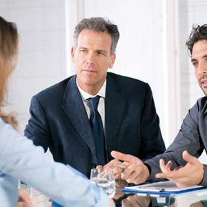 professionals in a business meeting file a divorce